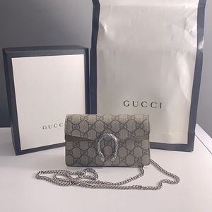 Gucci supreme super mini bag